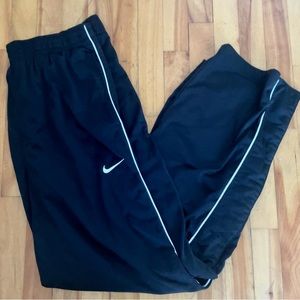 Black and White Nike Tearaway Track Pants
Size Mens’ Medium